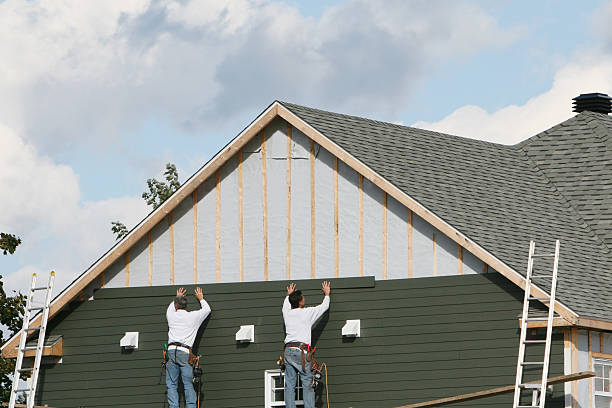 Professional Vinyl Siding technician working in Hopkinton, MA